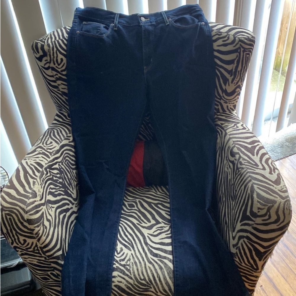 Levi boot cut jeans. Size 14 or 32 x 30. Never worn. Dark denim